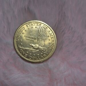 Gold-Toned One Dollar Coin with Eagle